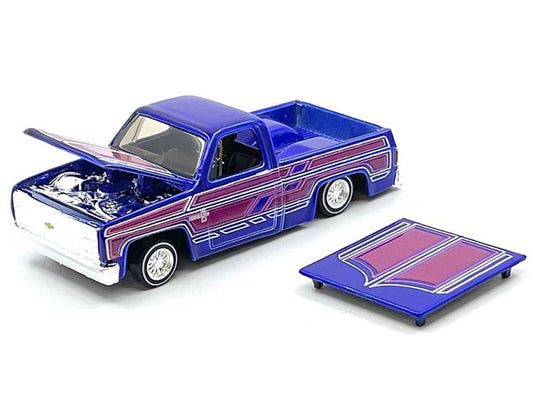 1987 Chevrolet 1500 Pickup Truck Blue Metallic with Graphics "Lowriders" "Maisto Design" Series 1/64 Diecast Model Car by Maisto