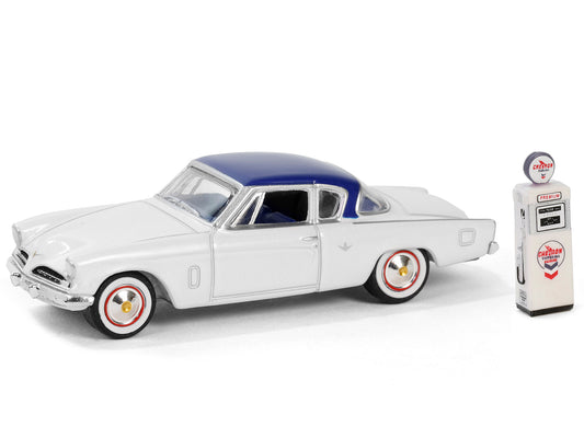 1954 Studebaker Commander Starliner White with Blue Top and Blue Interior with "Chevron Supreme" Vintage Wayne 505 Gas Pump "The Hobby Shop" Series 16 1/64 Diecast Model Car by Greenlight