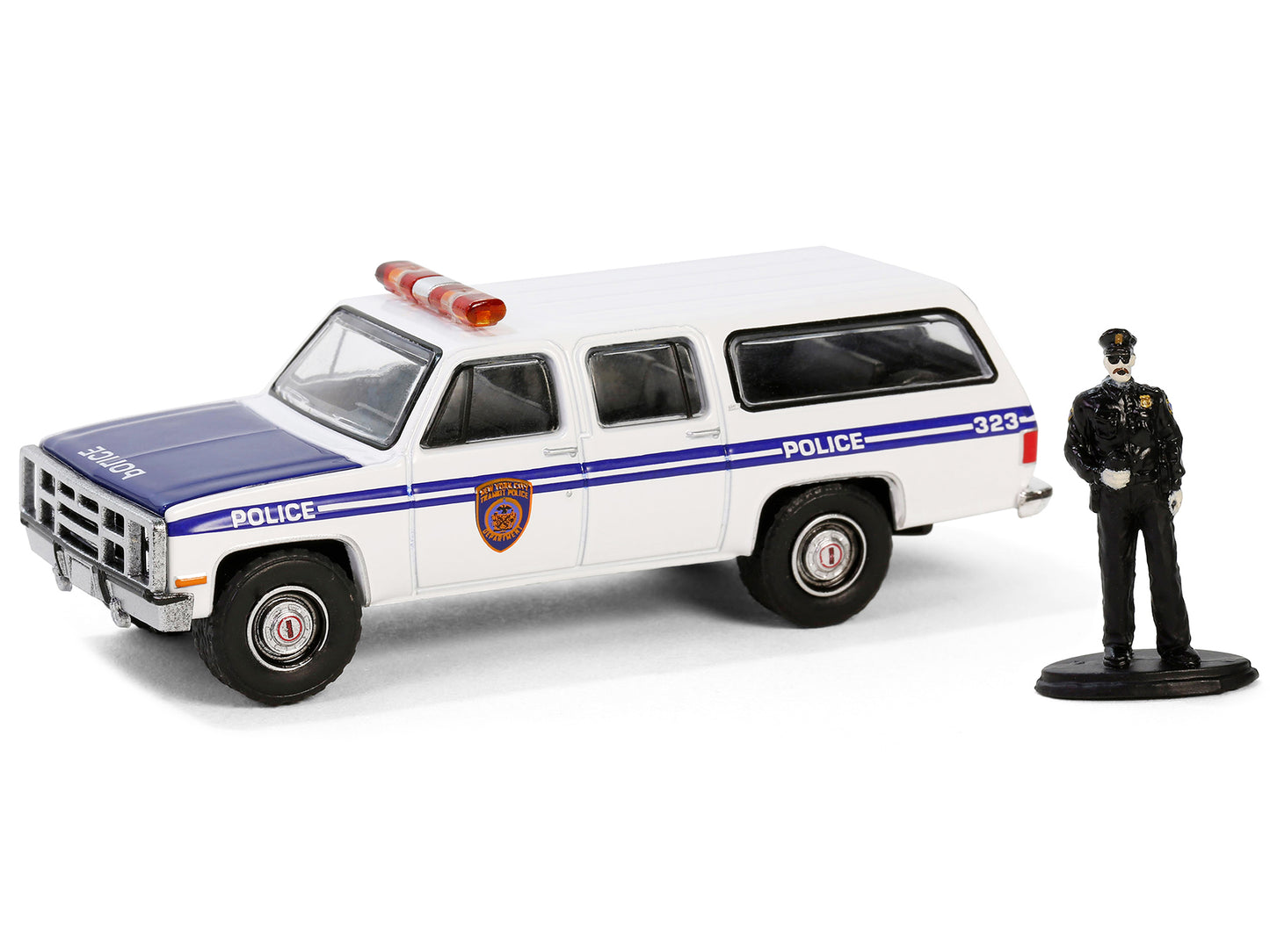 1985 GMC Suburban 2500 "New York City Transit Police Department" White with Blue Stripes and Police Officer Figure "The Hobby Shop" Series 16 1/64 Diecast Model Car by Greenlight