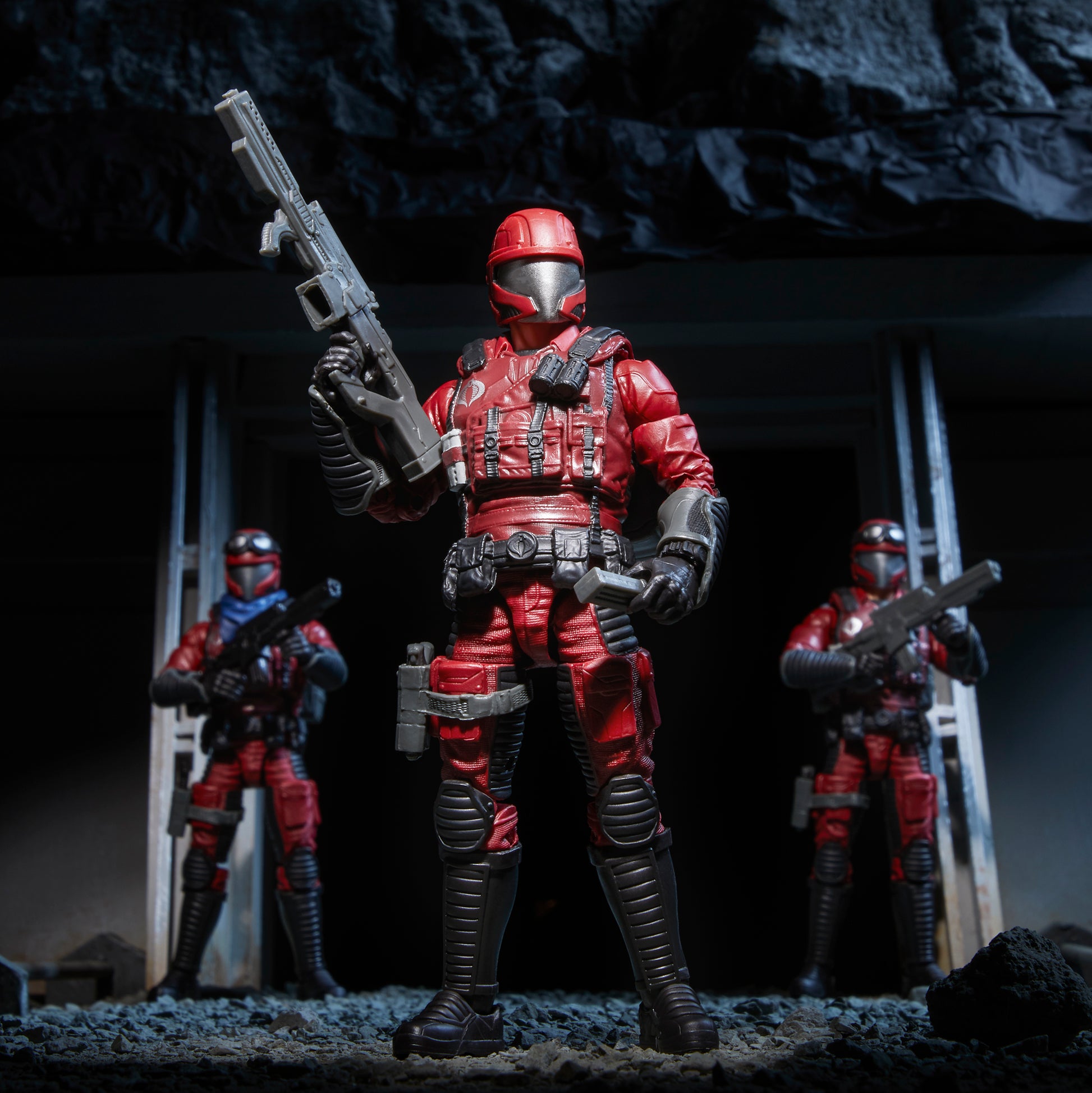 Crimson Viper Action Figure standing with gun in dark environment - Heretoserveyou