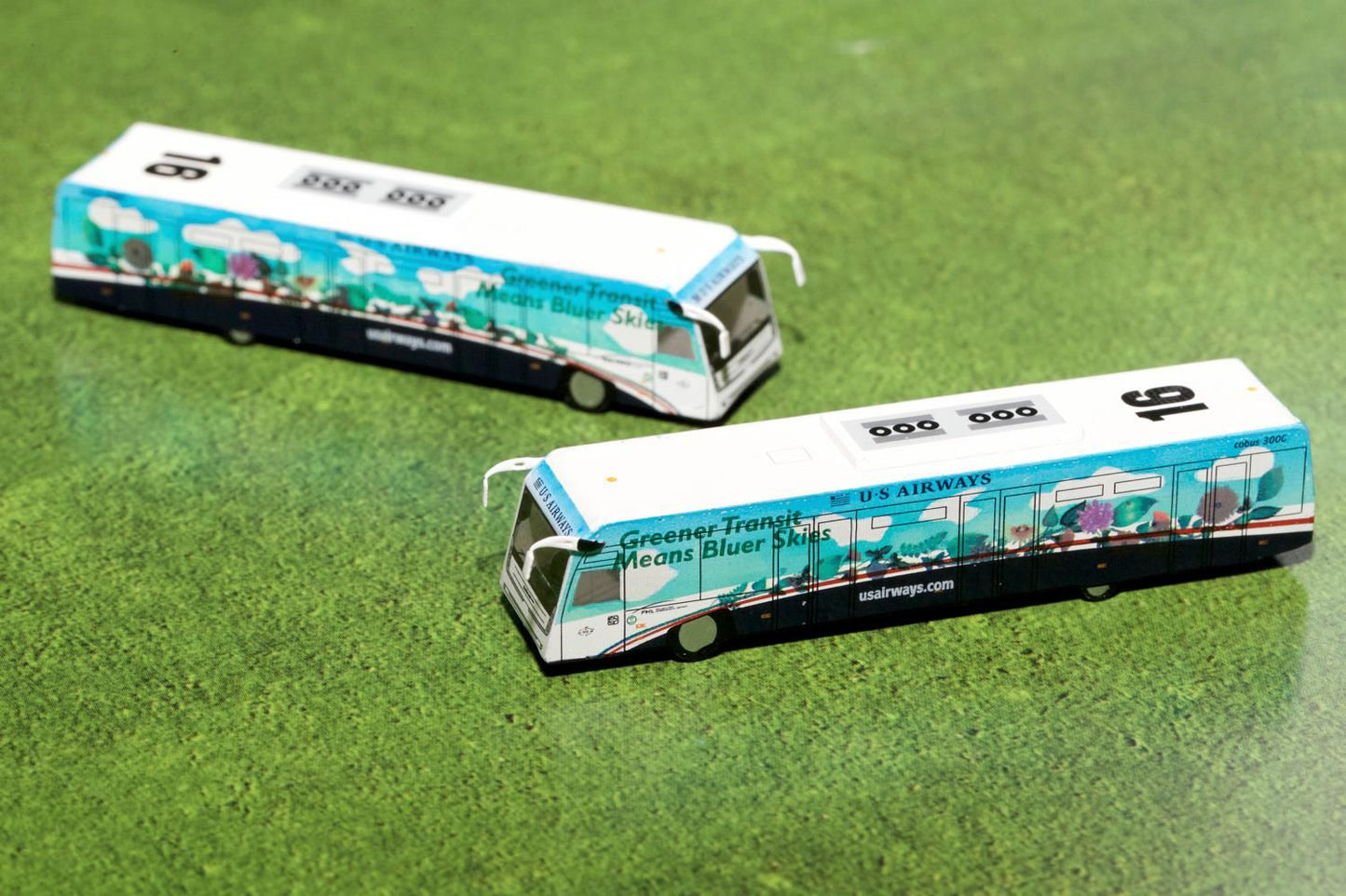 Cobus 3000 Passenger Bus White and Blue with Graphics "US Airways Shuttle Bus - Greener Transit" 2 Piece Set "Gemini 200" Series Diecast Models by GeminiJets